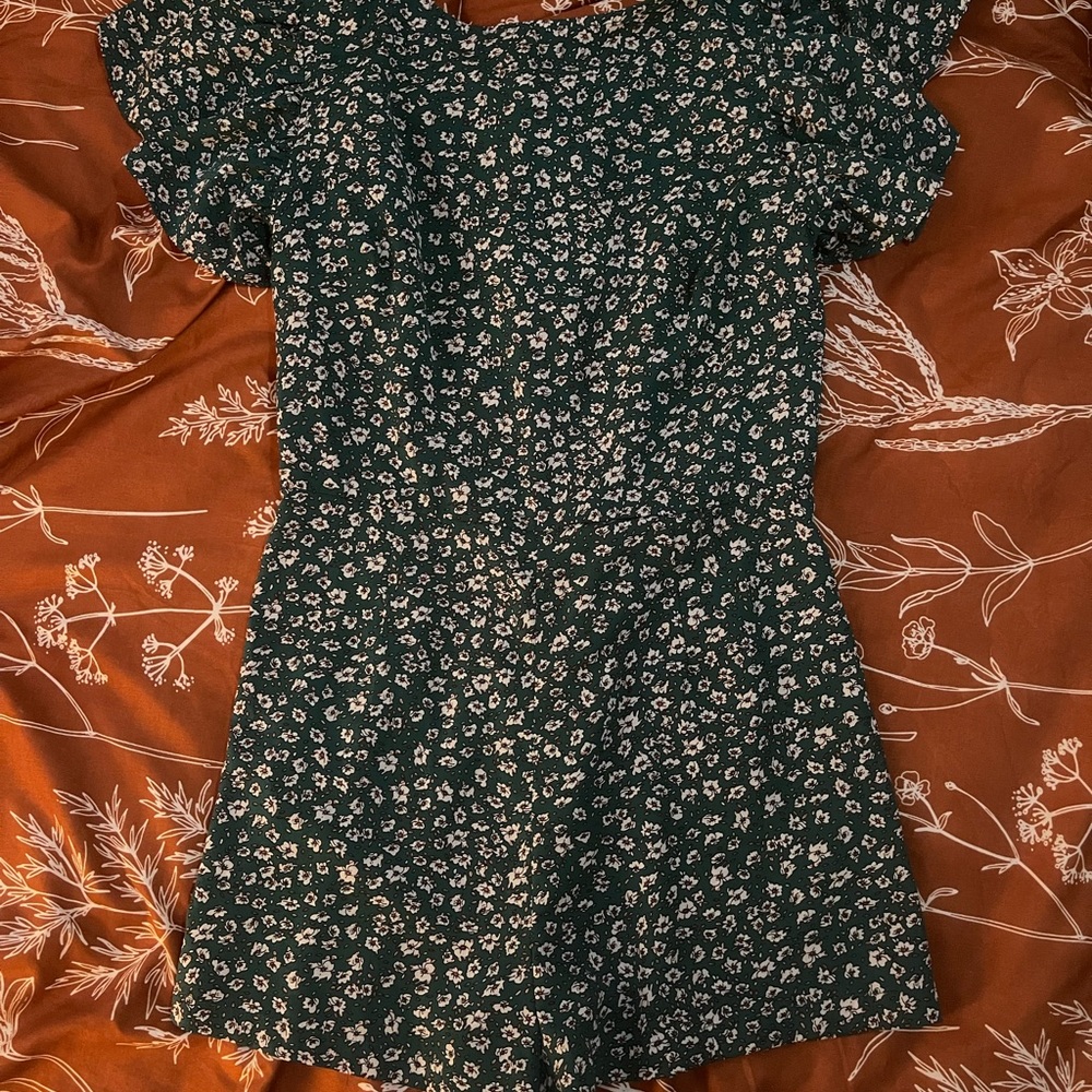 Green romper with cutout back